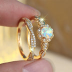 Opal Ring mit rundem Stein und Blütenkranz