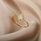Filigraner Opal Ring mit tropfenförmigem Stein