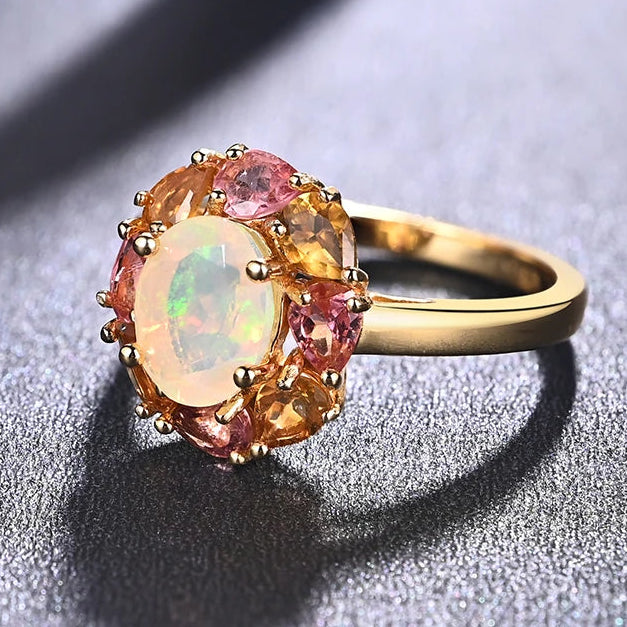 Opal Ring Gold mit Tourmalin-Kranz
