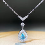 Aquamarin Halskette aus 14K Weißgold mit tropfenförmigem Anhänger und Ziersteinen