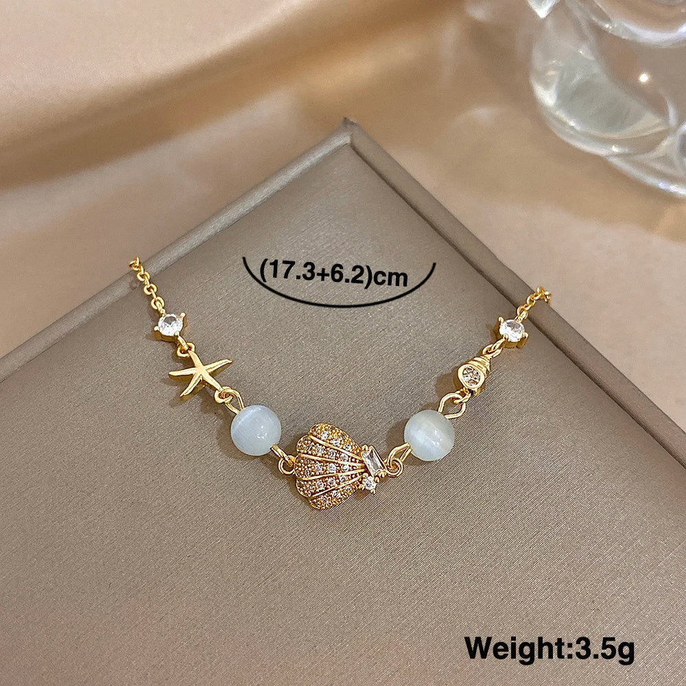 Mondstein Armband mit Muschel und Seestern