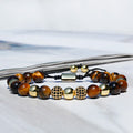 Tigerauge Armband mit goldfarbenen Zirkonia-Perlen