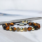 Tigerauge Armband mit goldfarbenen Zirkonia-Perlen