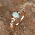 Opal Ring aus Roségold mit Mondsicheln und Ziersteinen