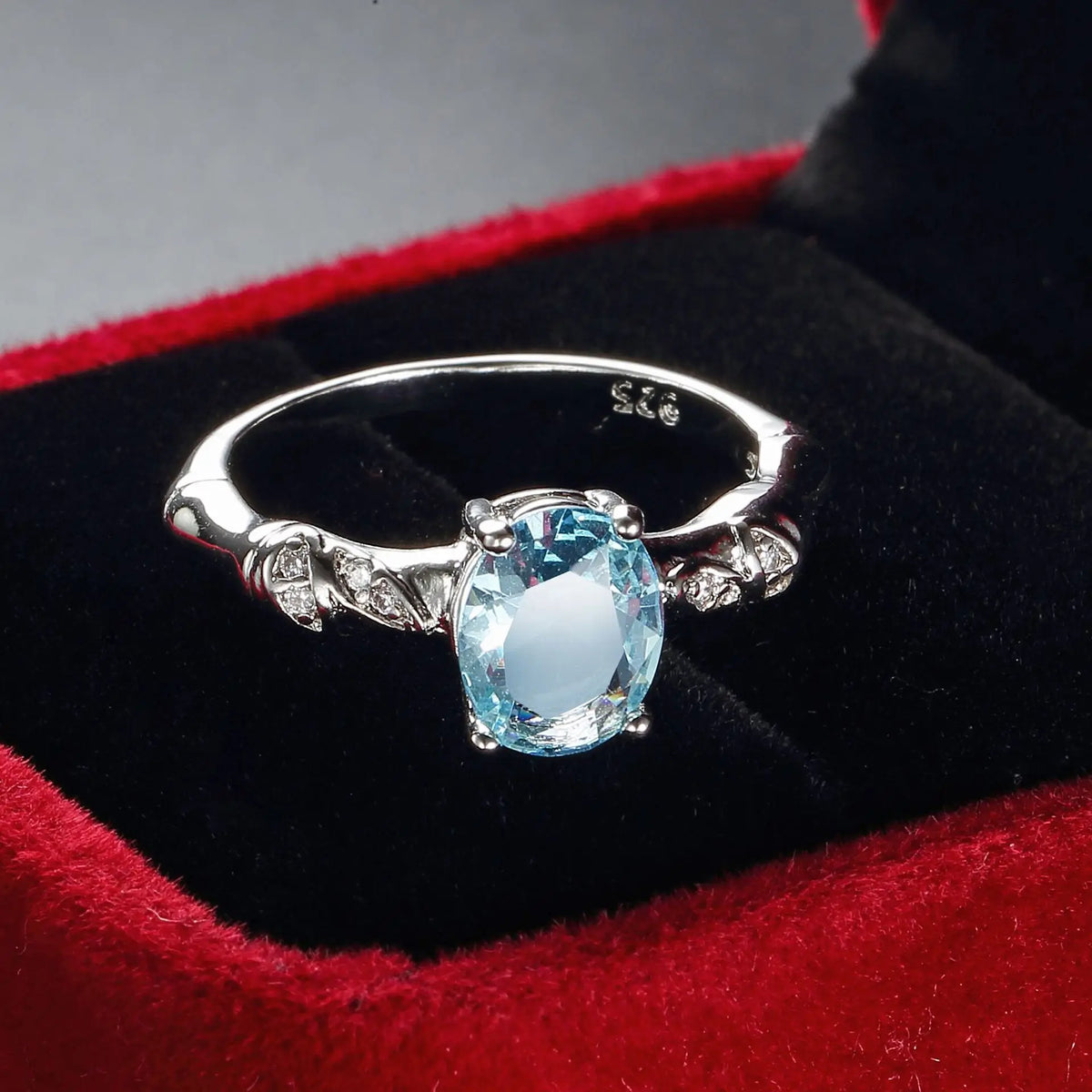 Aquamarin Look Ring mit ovalem Stein und Blattornamenten