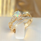 Opal Ring mit rundem Stein und Blütenkranz