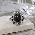 Floraler Onyx Ring aus 925er Silber mit Voluten und Blüten