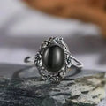 Floraler Onyx Ring aus 925er Silber mit Blütenrahmen