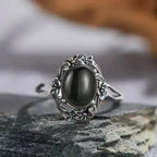 Floraler Onyx Ring aus 925er Silber mit Blütenrahmen