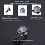 Mondstein Ring aus 925er Silber mit ovalem Cabochon und Voluten