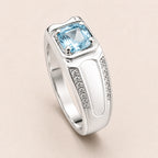 Aquamarin Look Ring mit quadratischem Stein und schwarzer Ringschiene