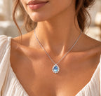 Aquamarin Kette aus 925er Silber 18K weißgoldvergoldet mit Tropfenanhänger und Ziersteinen