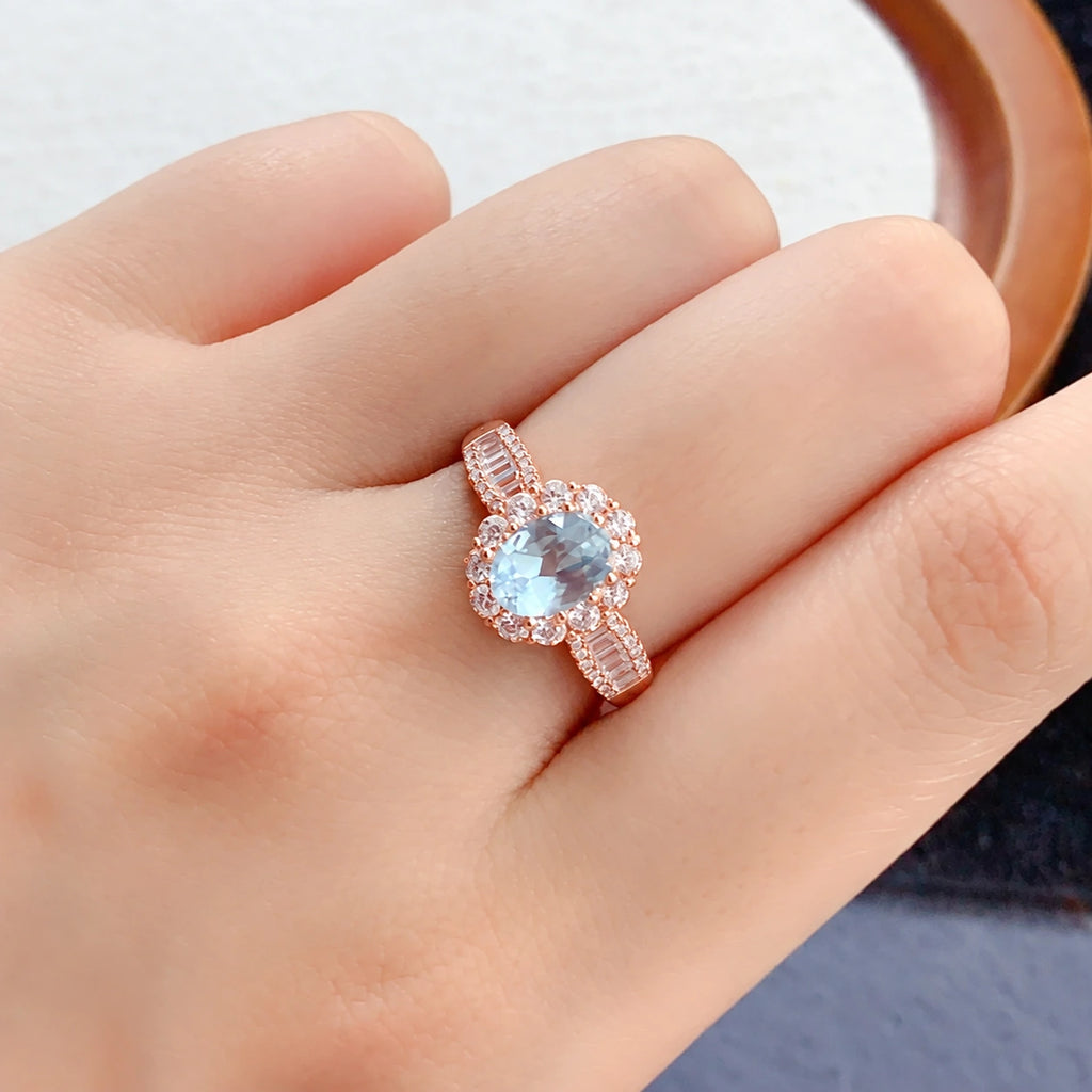 Roségoldfarbener Aquamarin Ring aus 925er Silber mit ovalem Mittelstein