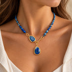 Lapislazuli Halskette mit facettierten Tropfenanhängern und Goldakzenten
