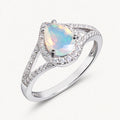 Opal Ring aus 925er Silber mit tropfenförmigem Stein und Halo-Fassung