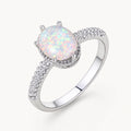 Opal Ring mit ovalem Mittelstein und Steinbesatz