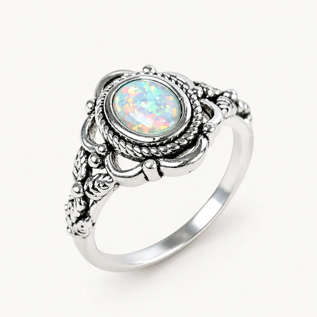 Opal Ring mit rundem Stein und Flechtrahmen