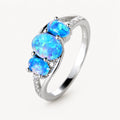 Blauer Opal Ring mit drei ovalen Steinen
