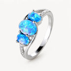 Blauer Opal Ring mit drei ovalen Steinen