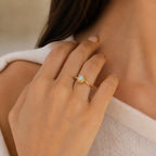 Filigraner Opal Ring mit tropfenförmigem Stein