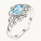 Jugendstil Aquamarin Ring aus 925er Silber mit ovalem Stein und Voluten