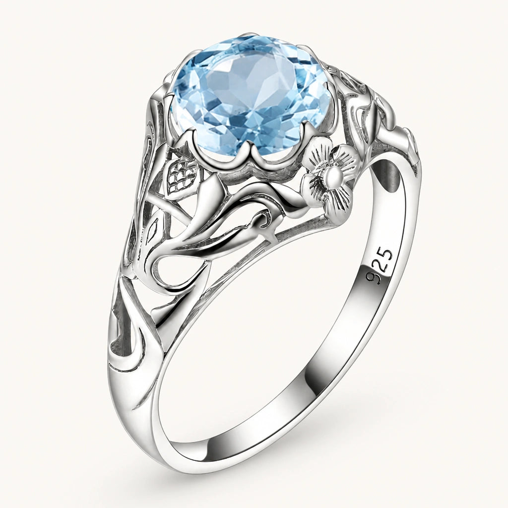 Aquamarin Ring antik aus 925er Silber mit rundem Stein und reich verzierten Seiten