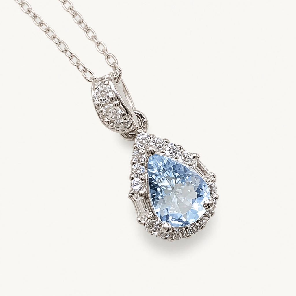 Aquamarin Halskette aus 925er Silber mit tropfenförmigem Anhänger und Ziersteinen