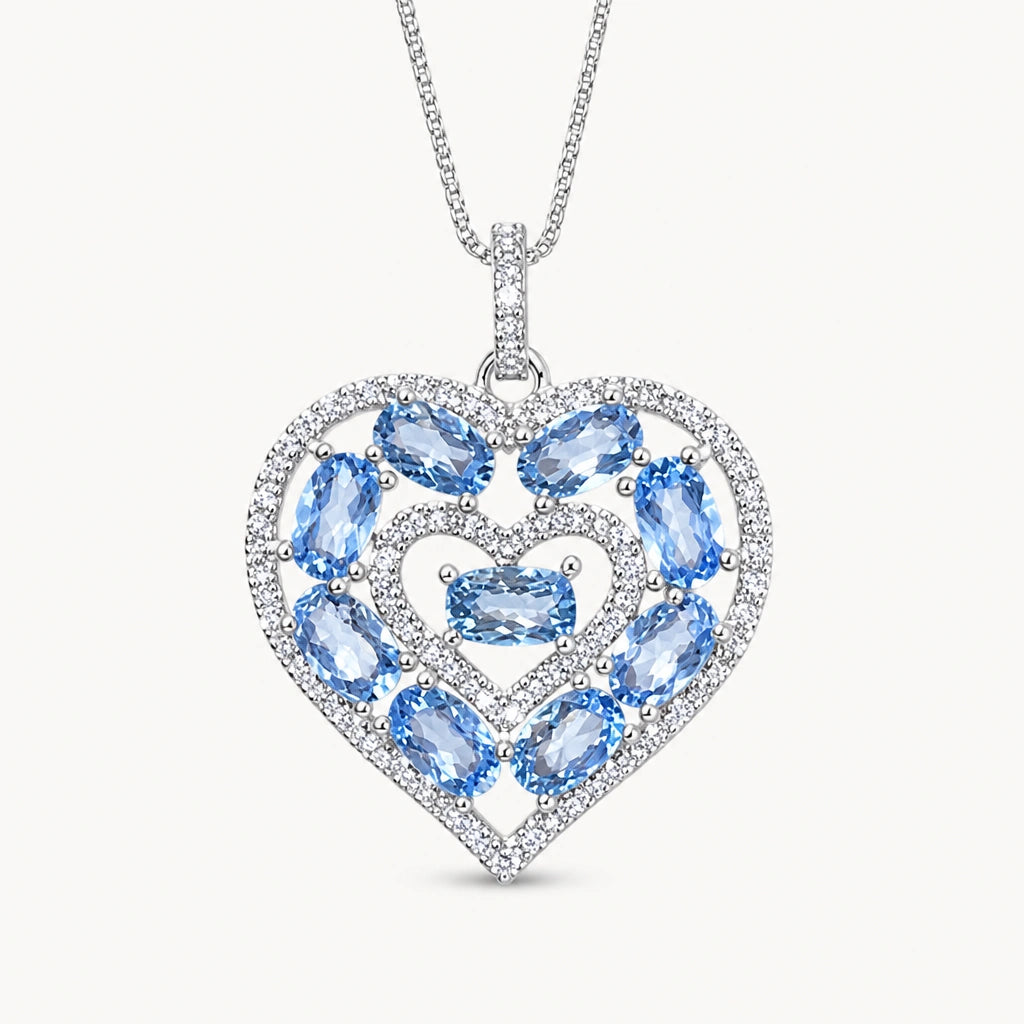 Aquamarin Halskette aus 925er Silber mit herzförmigem Anhänger und mehreren Steinen