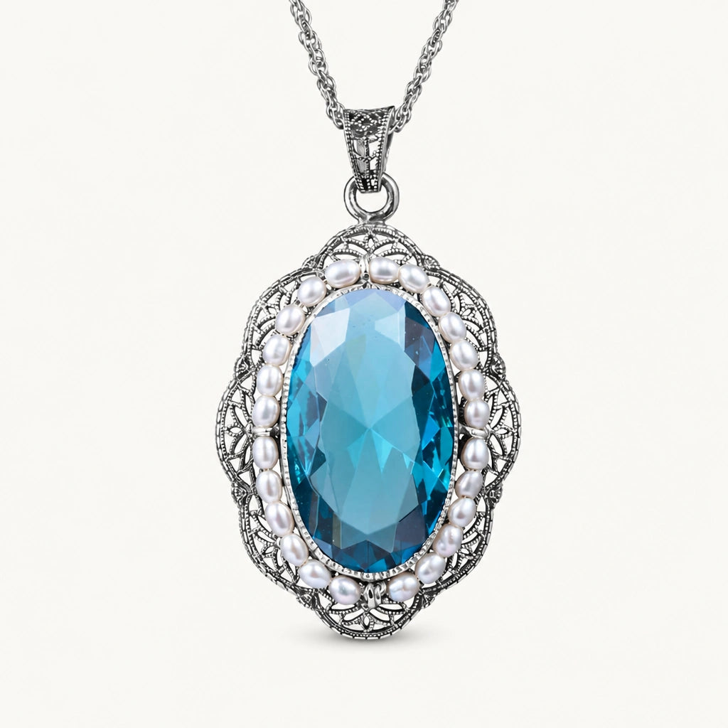 Aquamarin Kette aus 925er Silber mit ovalem Stein und filigranem Rahmen