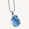 Aquamarin Kette aus 925er Silber mit facettiertem Stein und geschwungener Fassung