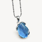 Aquamarin Kette aus 925er Silber mit facettiertem Stein und geschwungener Fassung