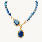 Lapislazuli Halskette mit facettierten Tropfenanhängern und Goldakzenten