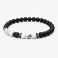 Onyx Armband mit weißen Howlith-Perlen