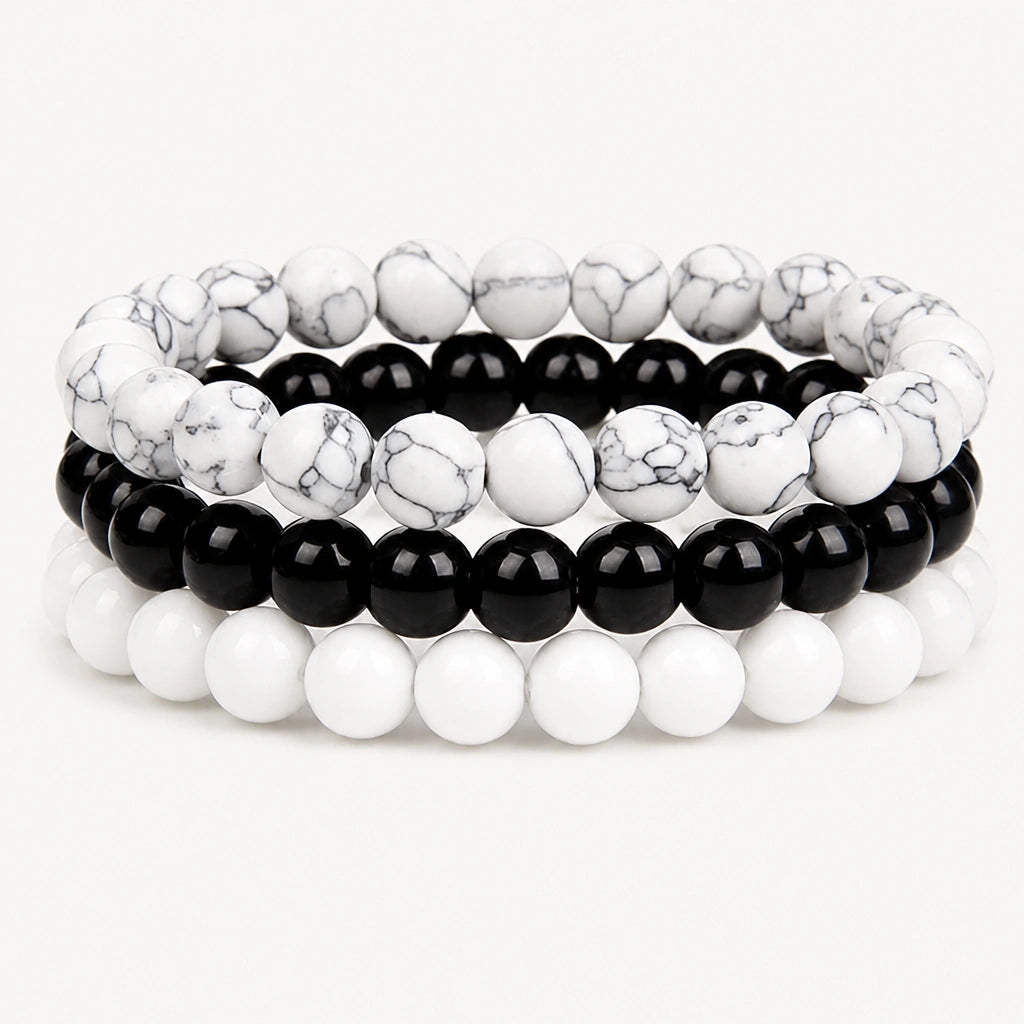 Onyx Armbänder Set mit schwarzen und weißen Howlith-Perlen