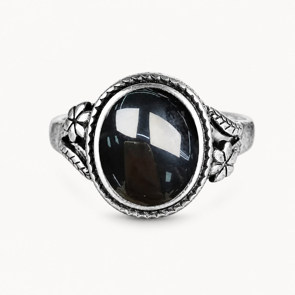 Onyx Ring aus 925er Silber mit Blüten und Zackenrahmen