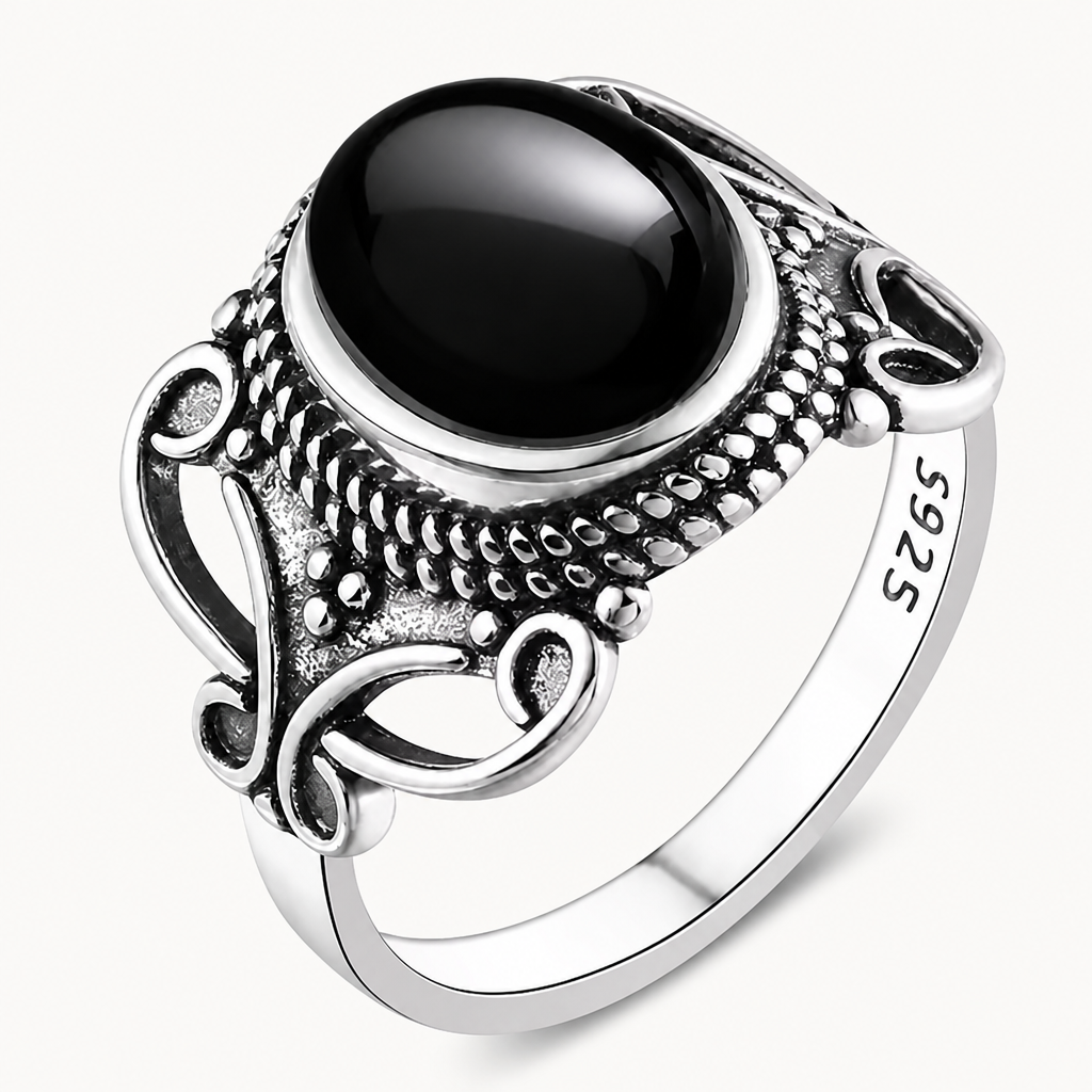 Vintage Onyx Ring aus 925er Silber mit durchbrochenem Ornamentrahmen