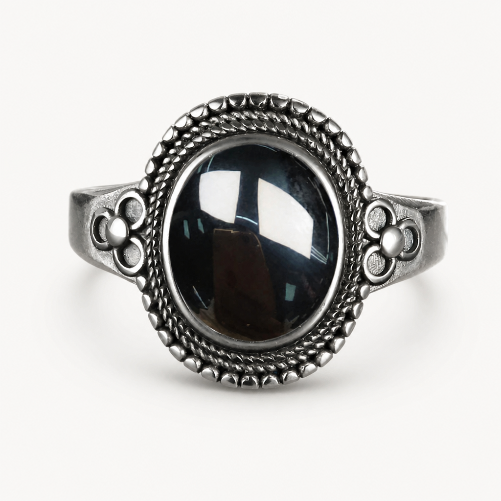 Onyx Ring aus 925er Silber mit ovalem Cabochon und Blütenrelief