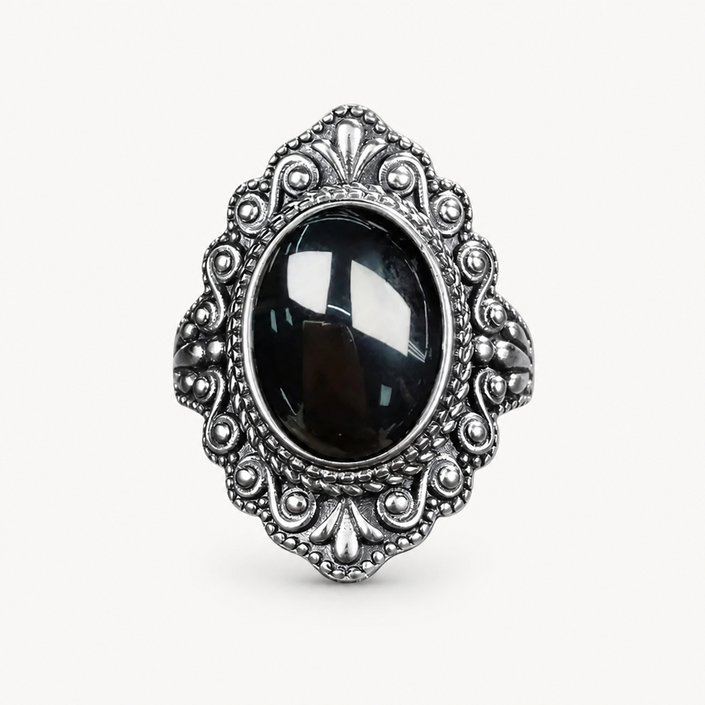 Vintage Onyx Ring aus 925er Silber mit ornamentalem Volutenrahmen