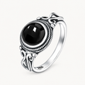 Onyx Ring aus 925er Silber mit ovalem Cabochon und Flechtrand